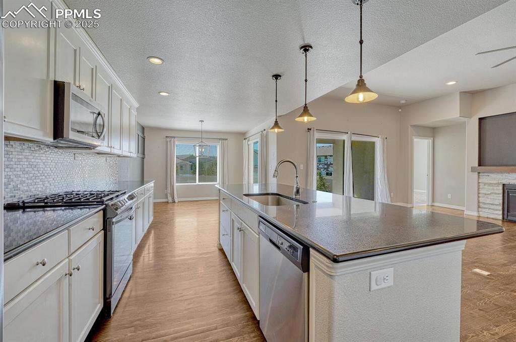 Image 18 of 45: Bring your passion for cooking to life in this exceptional kitchen, boastin