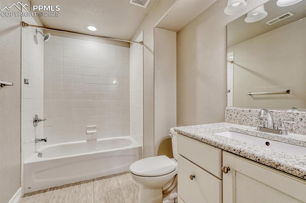 Image 27 of 45: The perfect blend of style and functionality in this gorgeous full bath, eq