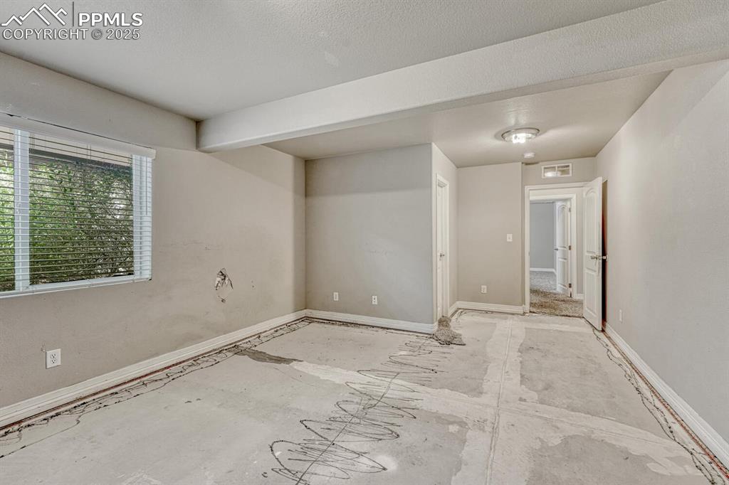 Image 29 of 45: This spare bedroom is ready for your personal touch, featuring baseboards, 