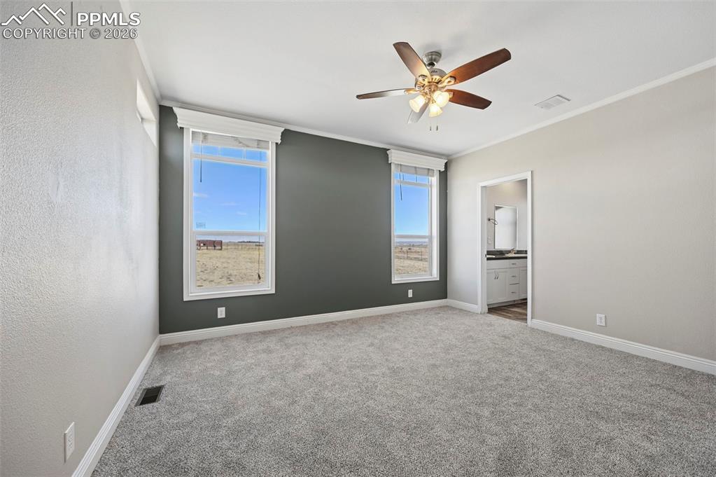 Image 28 of 34: Master Bedroom