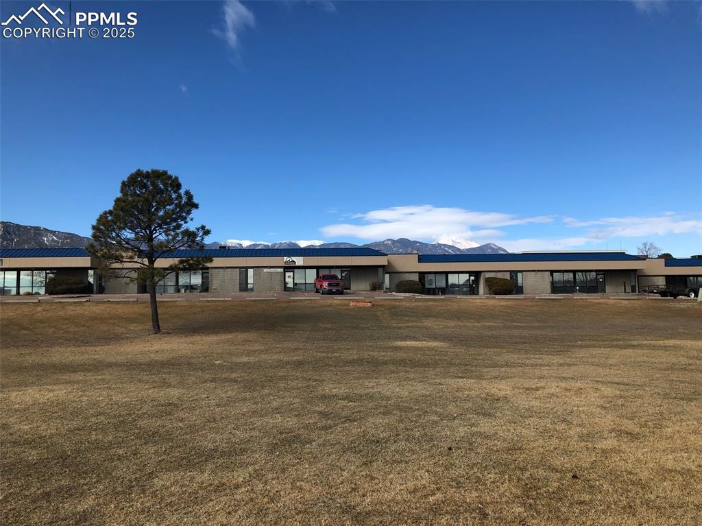 Image 5 of 31: View of front of house featuring a front lawn