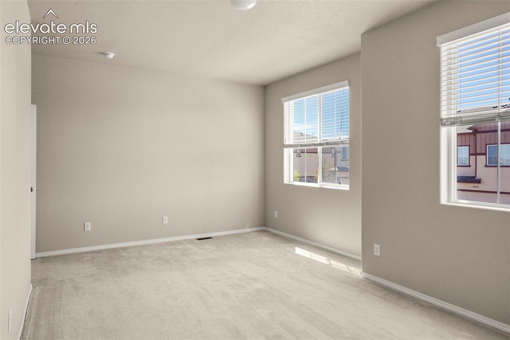 Image 8 of 29: Primary bedroom suite