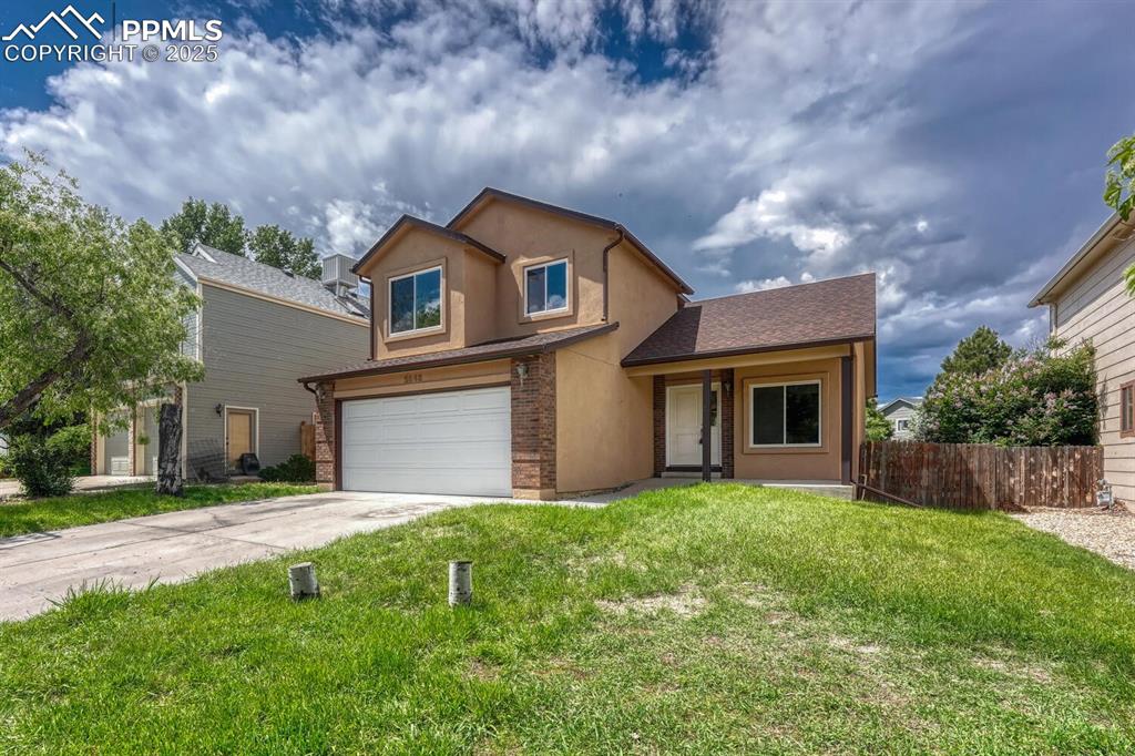 Caption: 3BR, 3BA stucco home in the desirable Sundown community of Colorado Springs.