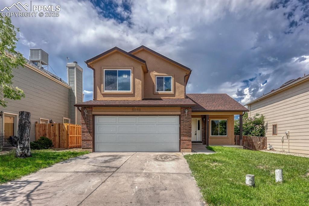 Image 2 of 40: 2,554 sf of well-designed living space with 2-car attached garage.
