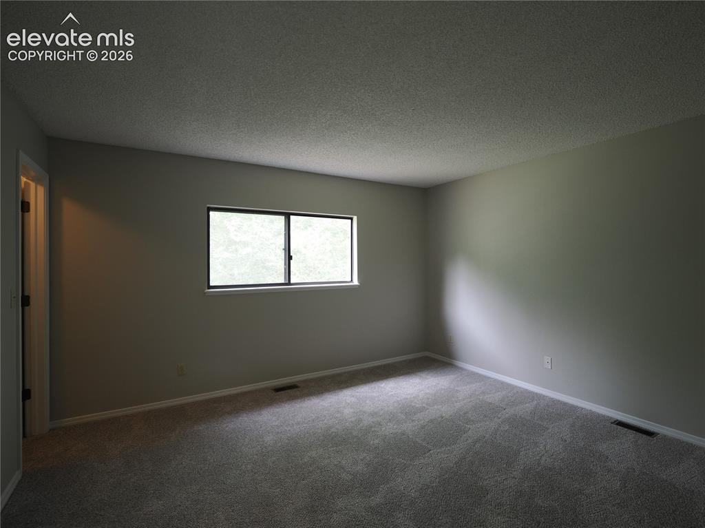 Image 13 of 31: Master Bedroom