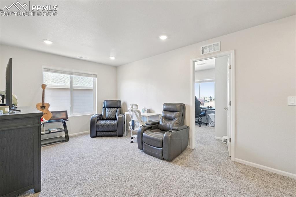 Image 16 of 34: Upstairs family room is a great blank space for your needs- loft, playroom,