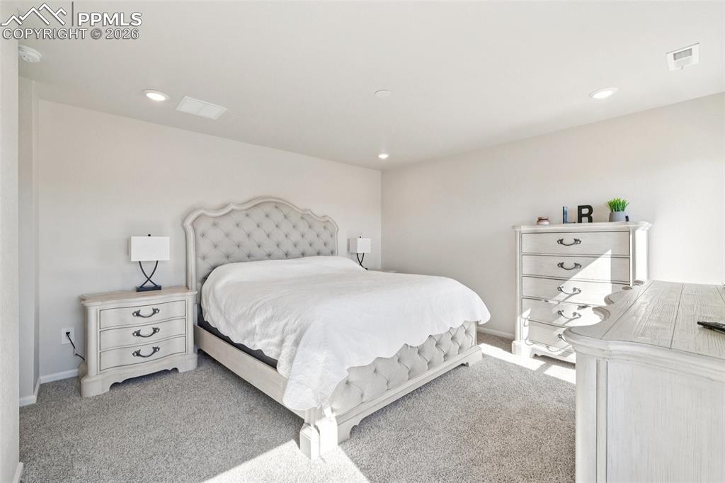 Image 21 of 34: Upstairs Primary Bedroom