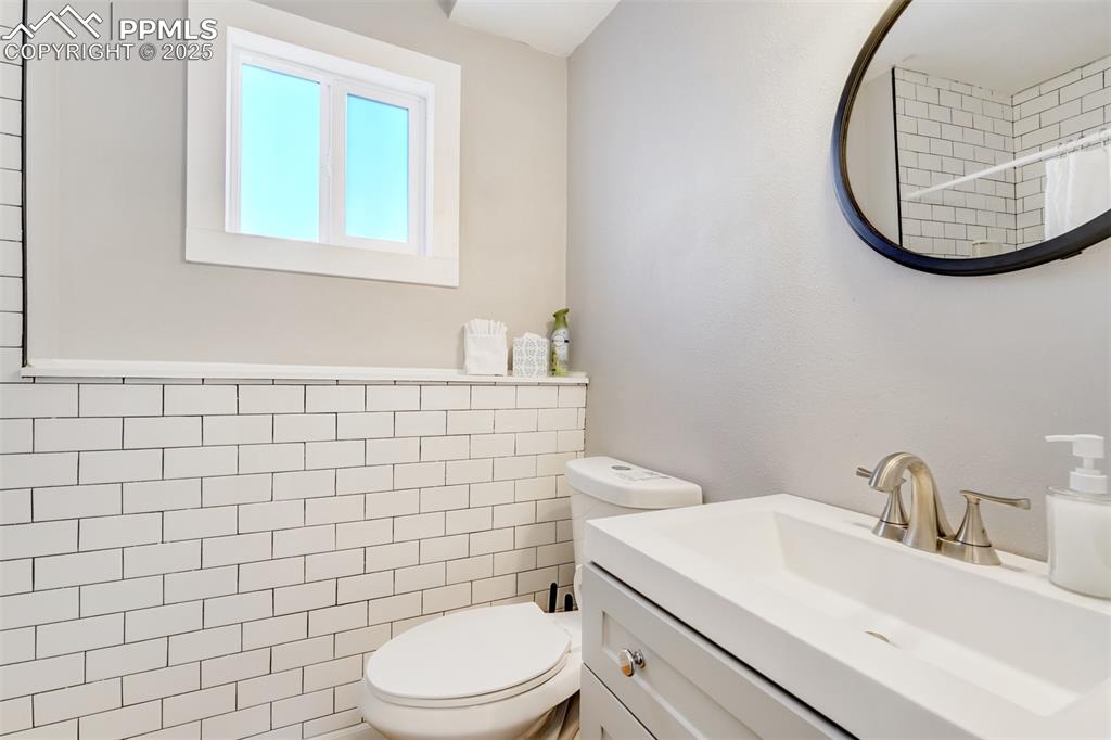 Image 25 of 25: Full bath featuring vanity and a shower