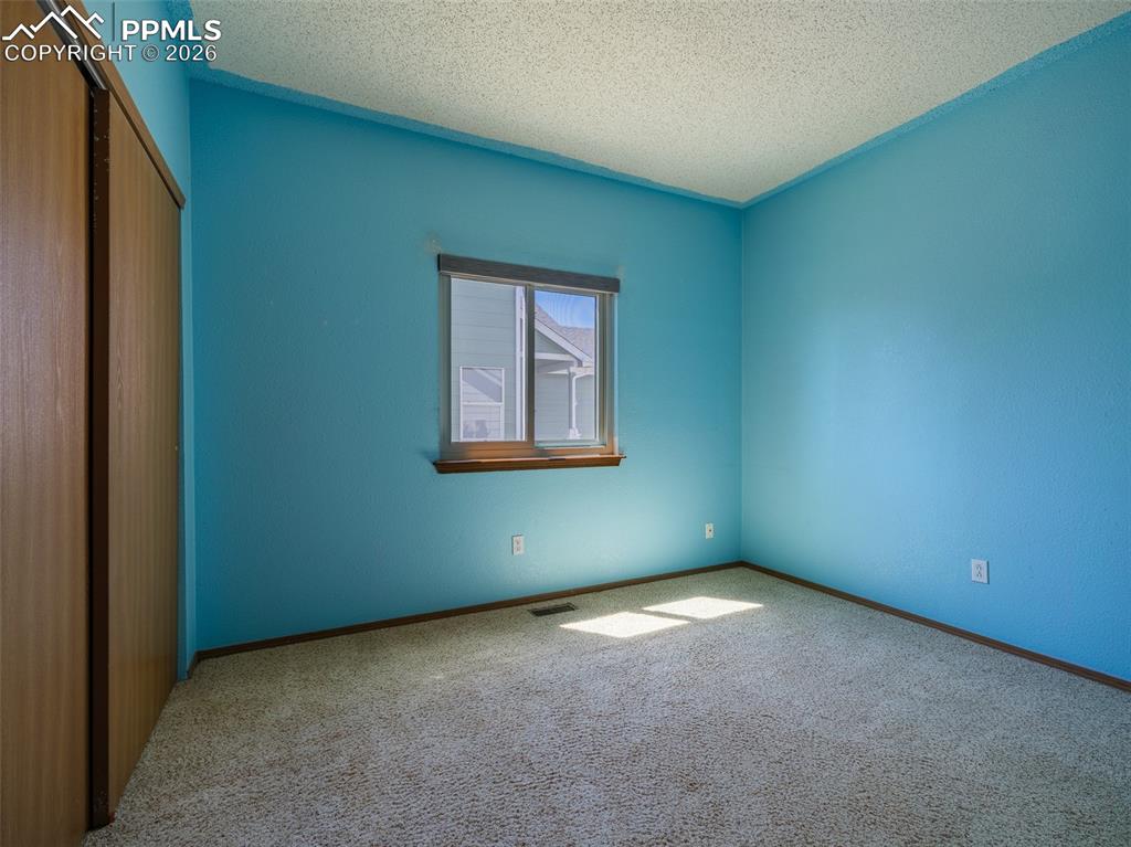 Image 16 of 38: Bedroom