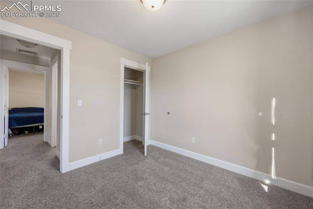 Image 29 of 36: Bedroom