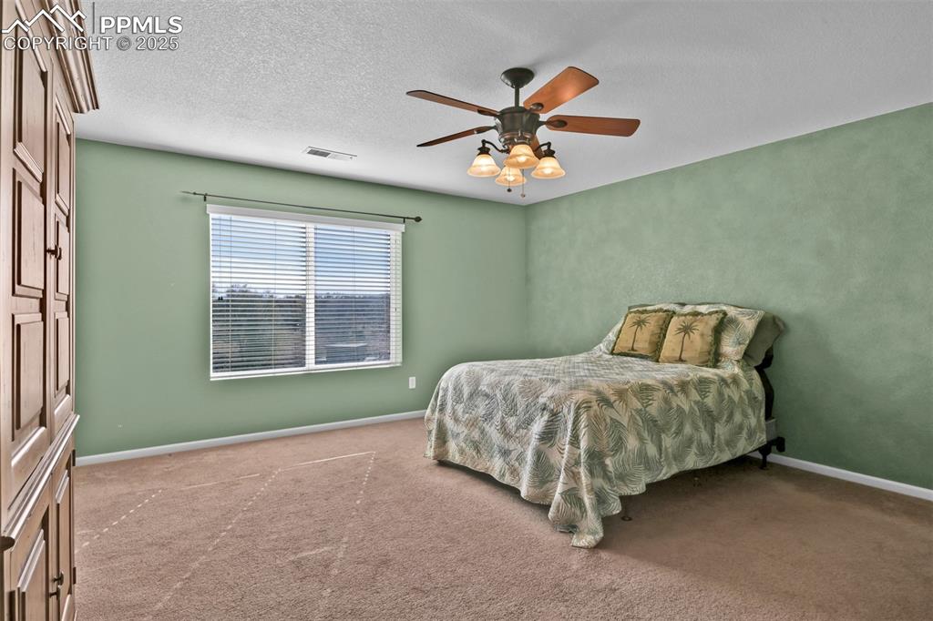 Image 19 of 50: Master Bedroom