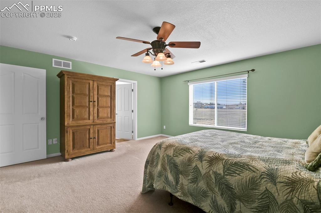 Image 20 of 50: Master Bedroom