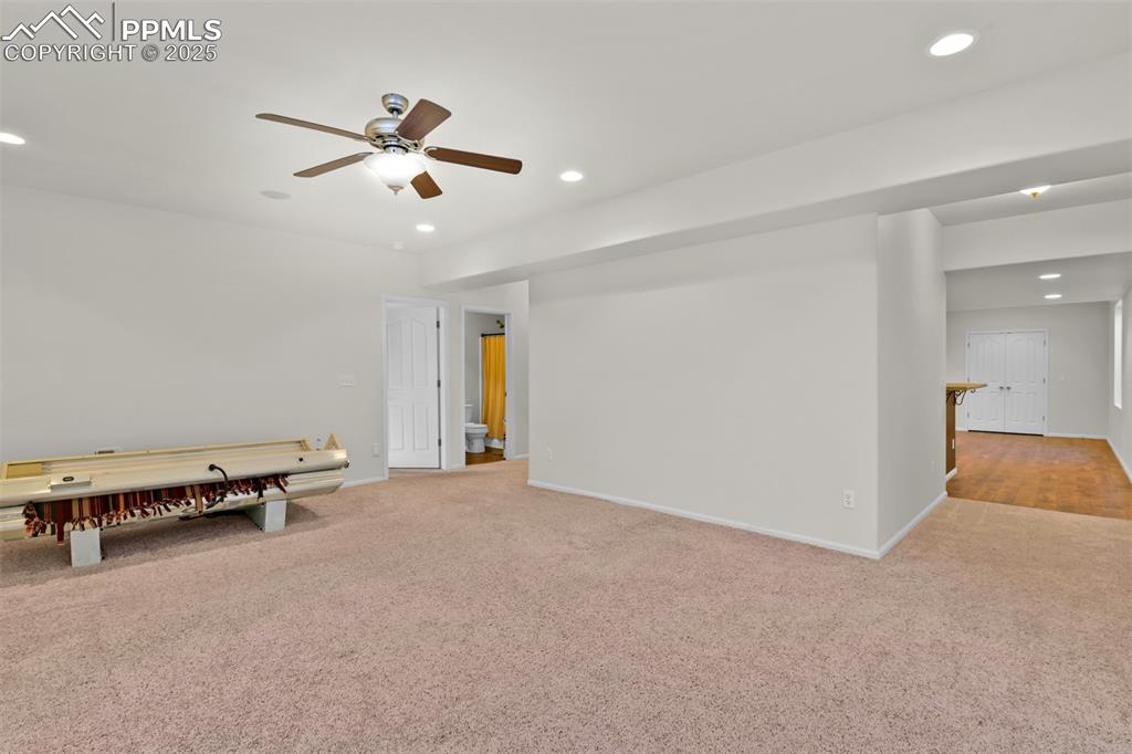 Image 37 of 50: Den in the Basement w/ Optional Tanning Bed