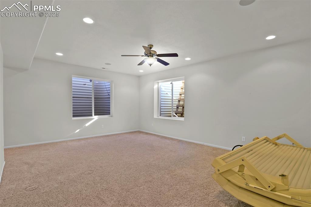 Image 38 of 50: Den in the Basement w/ Optional Tanning Bed