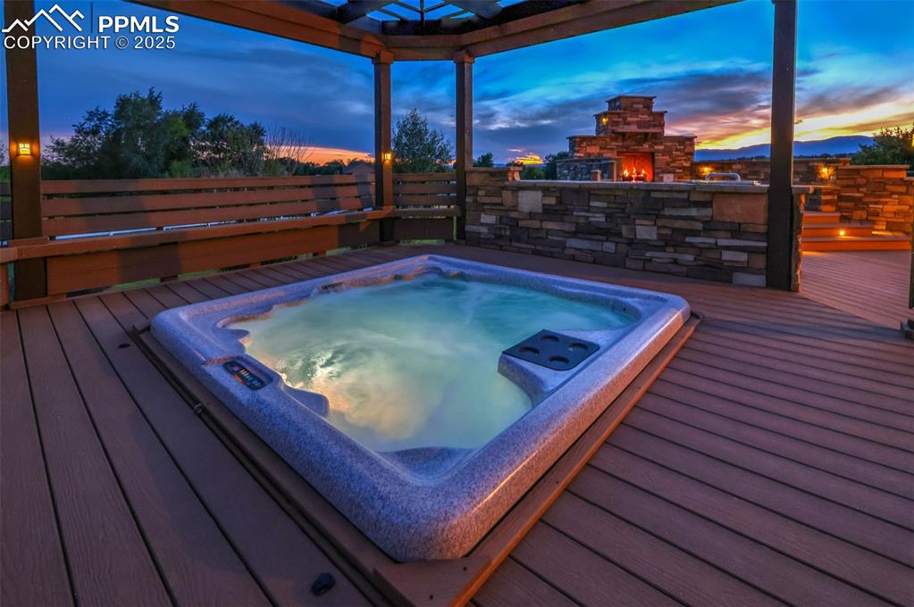 Image 44 of 50: Covered Hot Tub