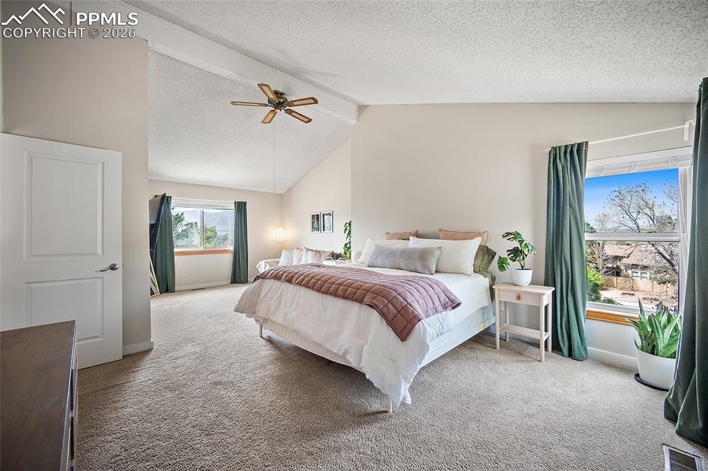 Image 11 of 47: Upper level primary suite