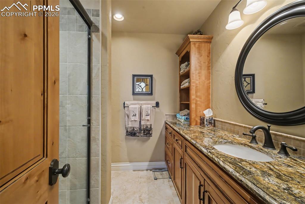 Image 40 of 50: Downstairs full bath