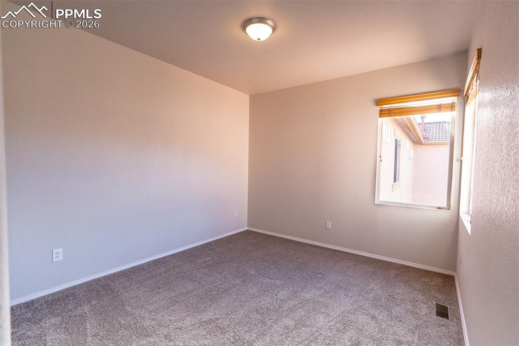 Image 19 of 26: Secondary Bedroom