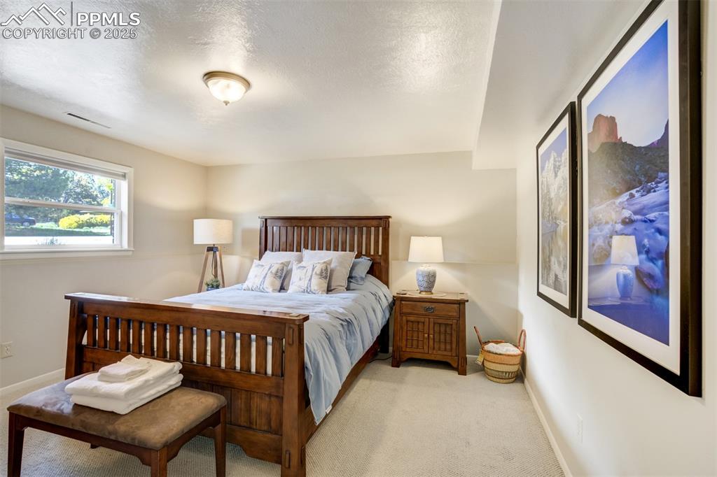 Image 23 of 50: Bedroom