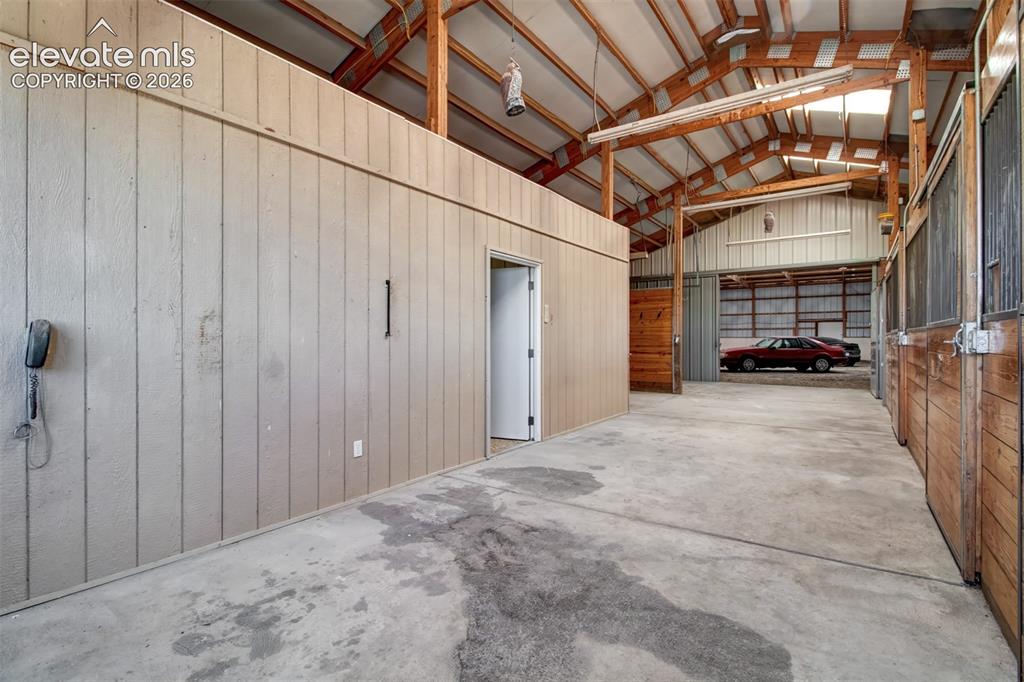 Image 7 of 50: Looking Into The Arena With 3-Stalls And Hay Stall On The Right, Caretakers