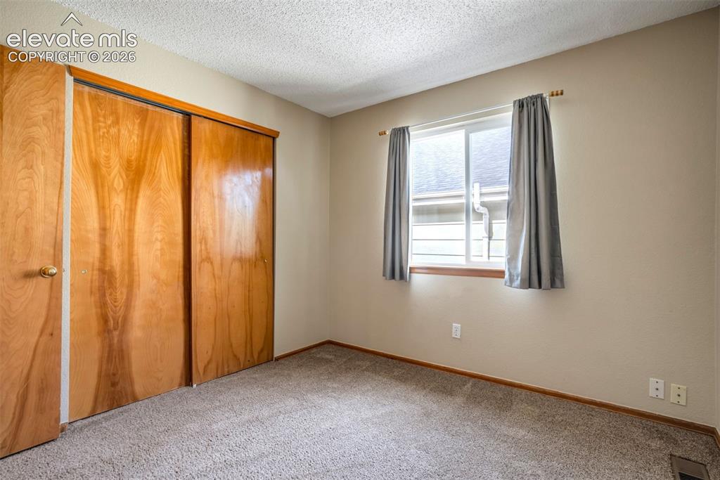 Image 18 of 33: Bedroom