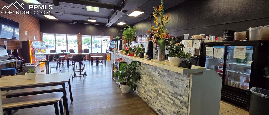 Image 5 of 5: Welcome area with brick wall