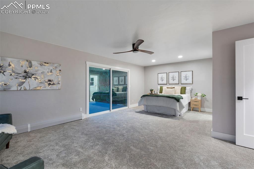 Image 16 of 48: Bedroom with carpet floors, access to exterior, recessed lighting, and ceil