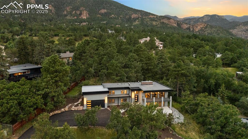 Image 37 of 48: View from above of property featuring mountains