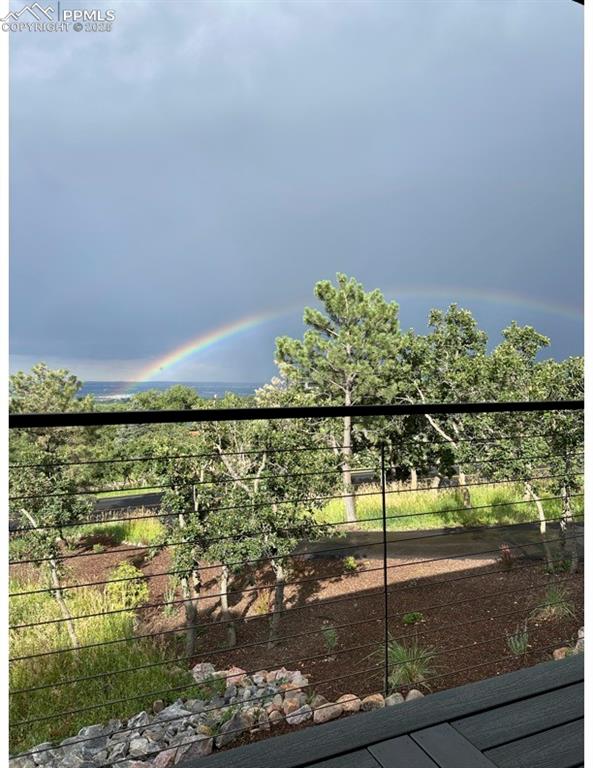 Image 46 of 48: Afternoon Thunderstorms from Front Deck