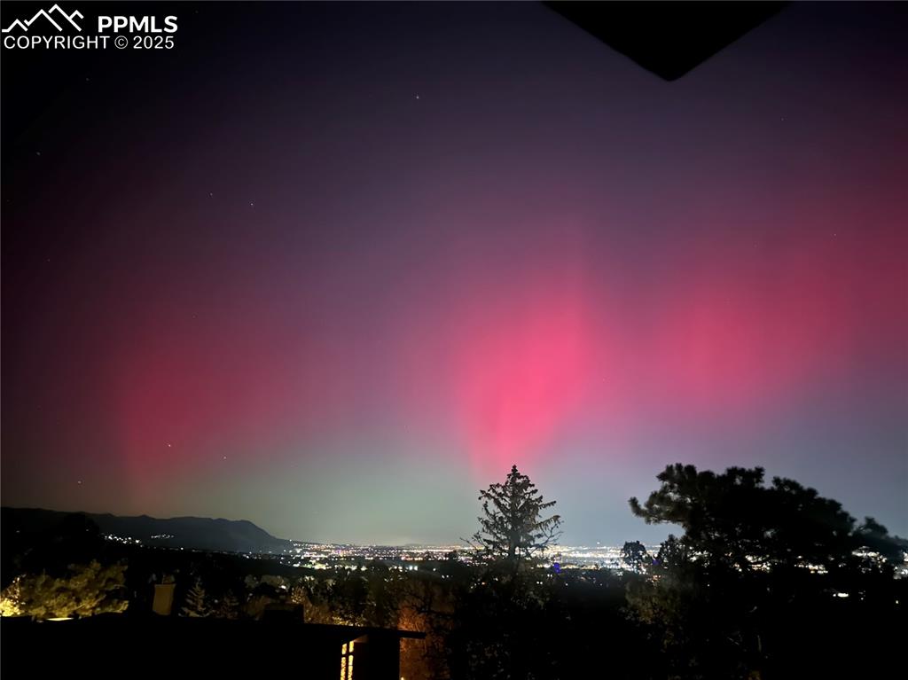 Image 47 of 48: Northern Lights from the Front Deck