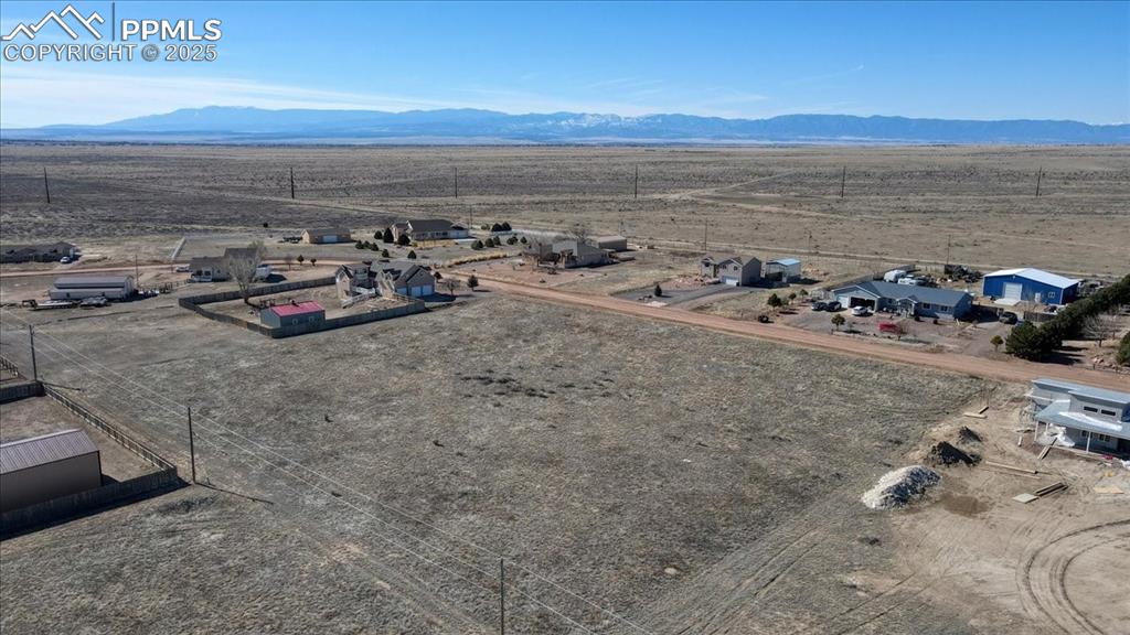 Image 3 of 9: Drone / aerial view featuring a mountain view