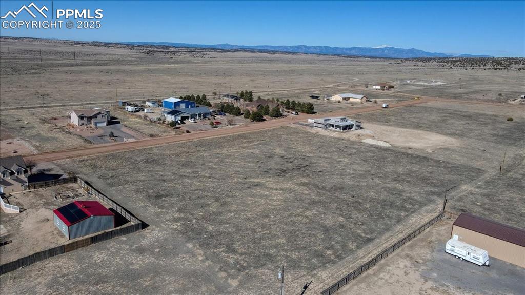 Image 4 of 9: Drone / aerial view with a mountain view