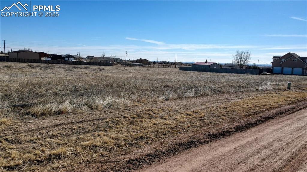 Image 6 of 9: View of yard with a rural view