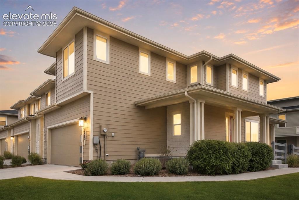 Image 1 of 28: End-unit townhome in Wolf Ranch