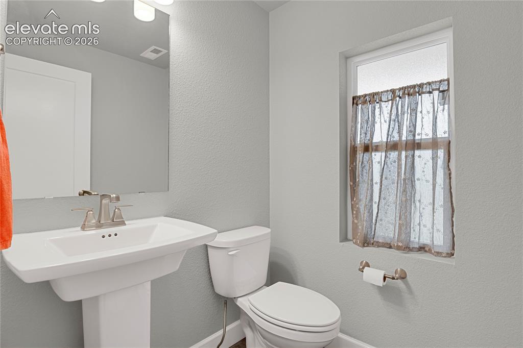 Image 10 of 28: Main level powder bath