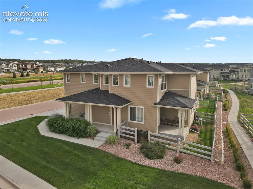 Image 18 of 28: Private back patio and fenced yard - rare for townhomes