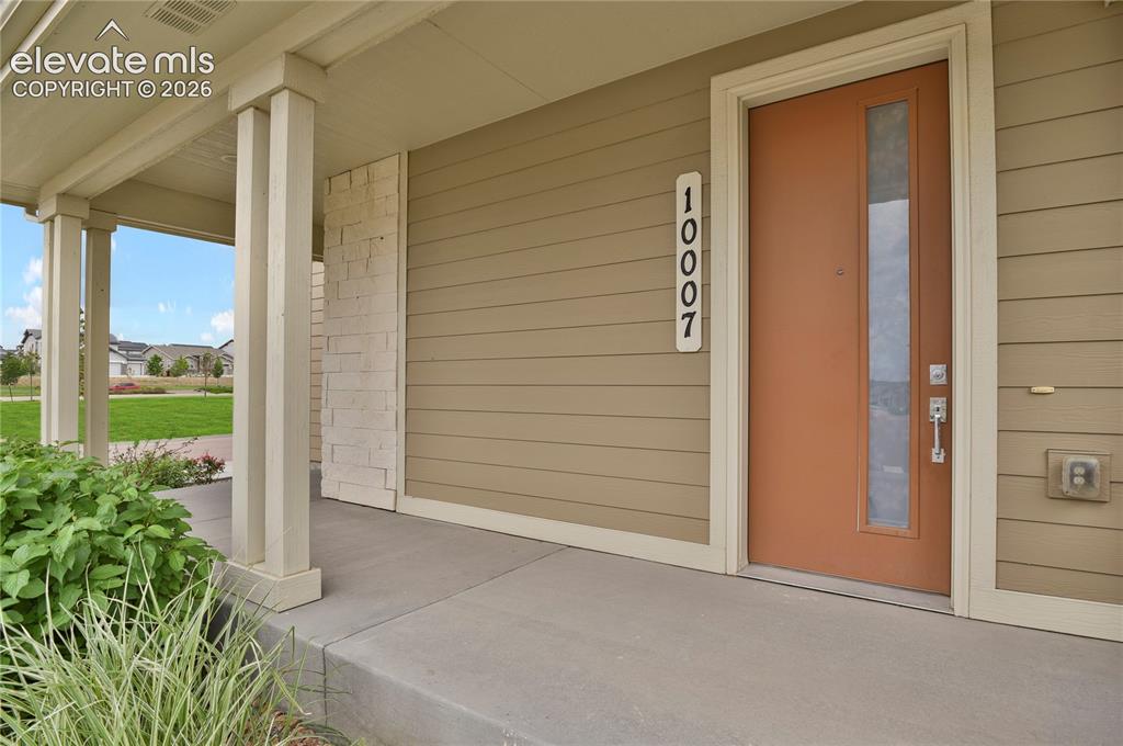 Image 4 of 28: Welcoming covered front porch