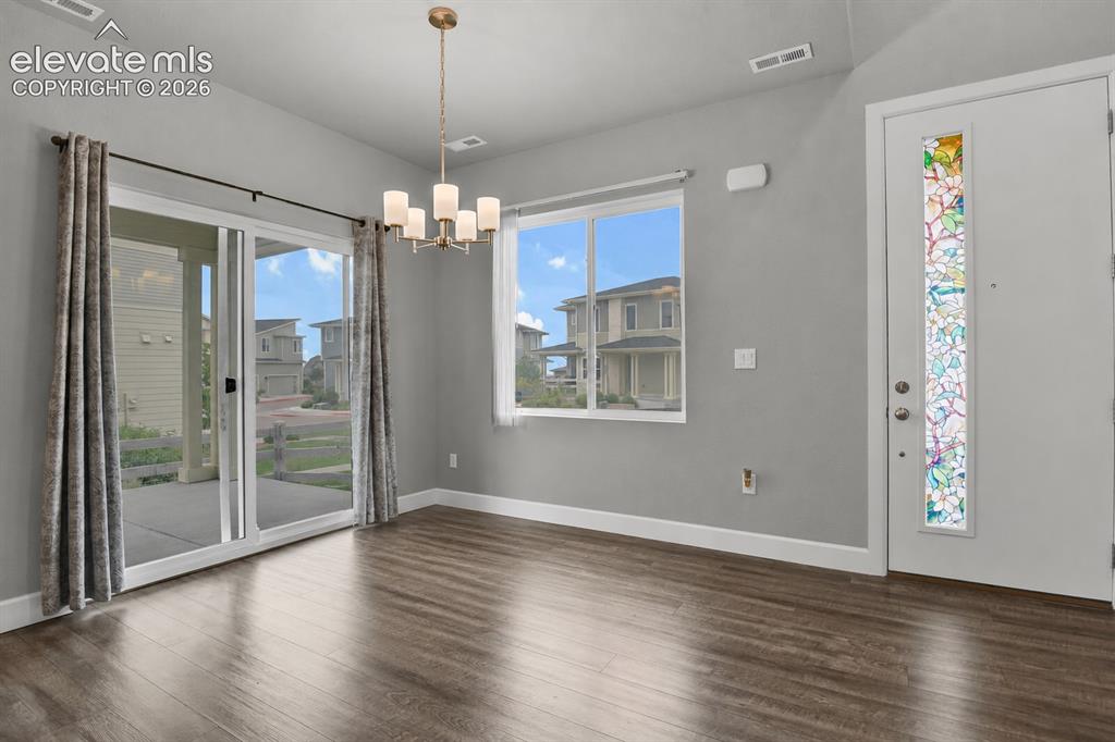 Image 9 of 28: Walk-out to back patio