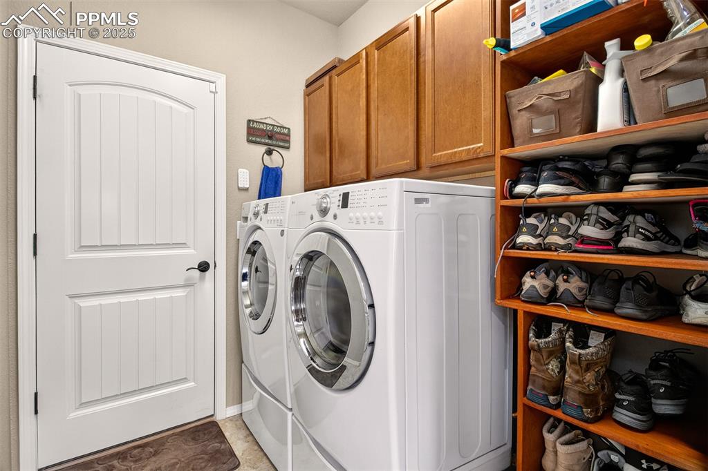 Image 14 of 48: Washer and Dryer with the pedistals are included along with the Custom made
