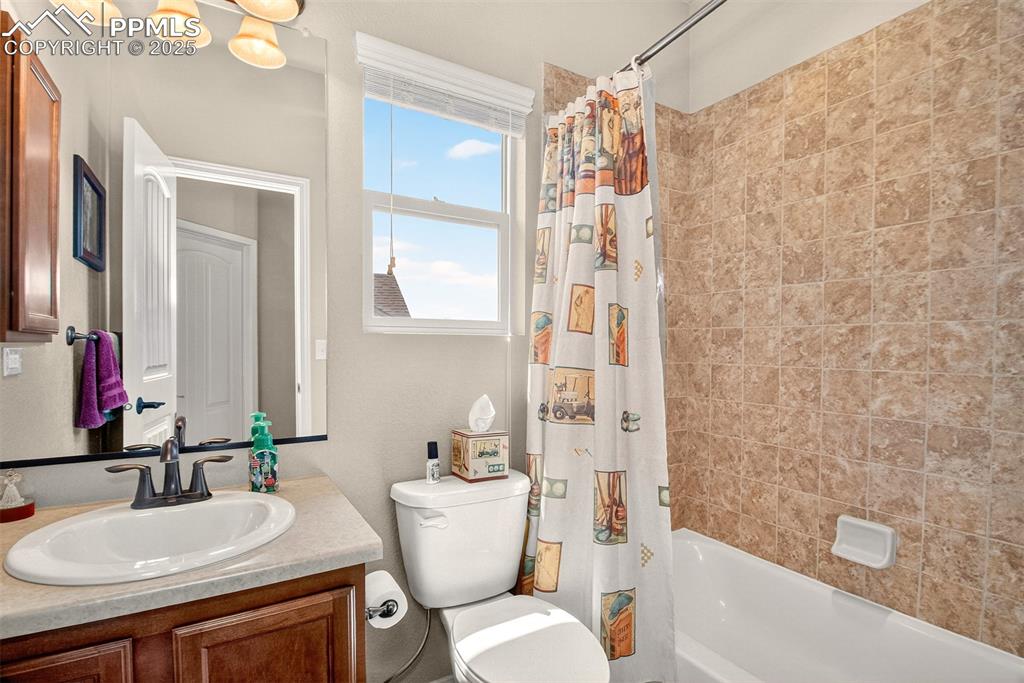 Image 20 of 48: Hall bathroom. 