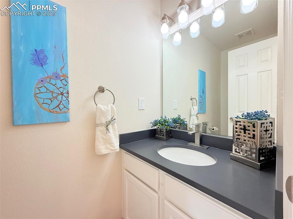 Image 20 of 44: Bathroom featuring vanity