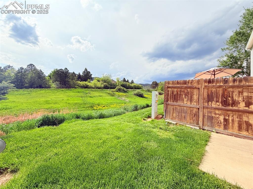 Image 41 of 44: View of yard featuring a view of rural / pastoral area