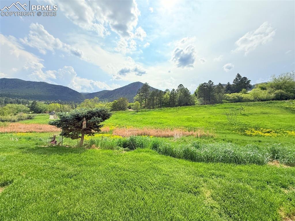 Image 43 of 44: View of mountain backdrop featuring rural landscape