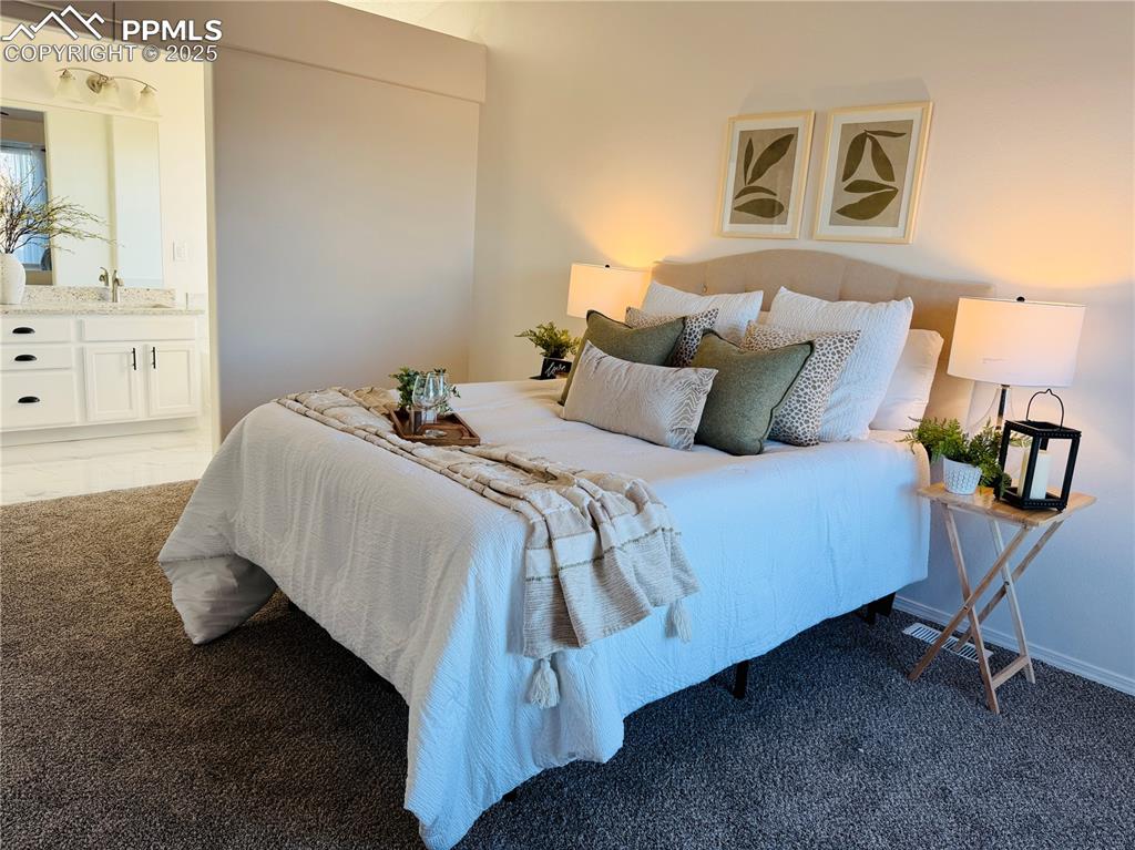 Image 14 of 38: Bedroom