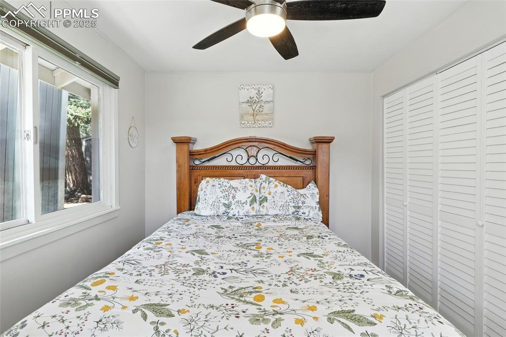 Image 32 of 43: Bedroom featuring a closet and ceiling fan