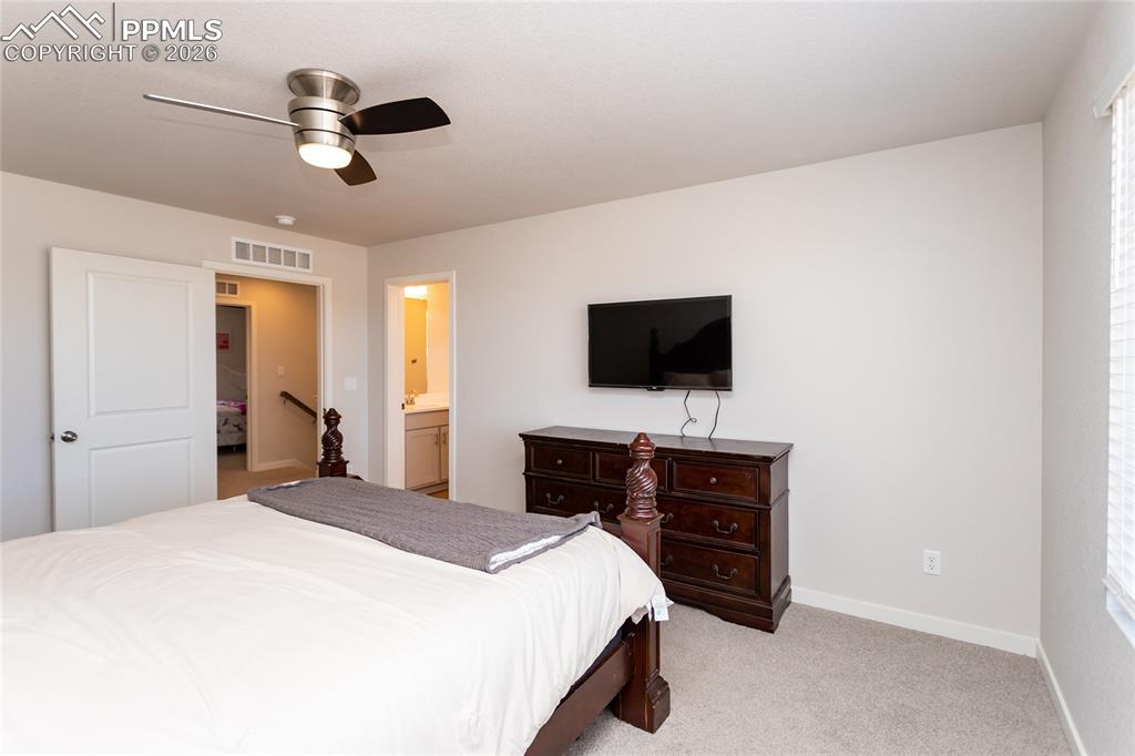 Image 21 of 50: Master Bedroom