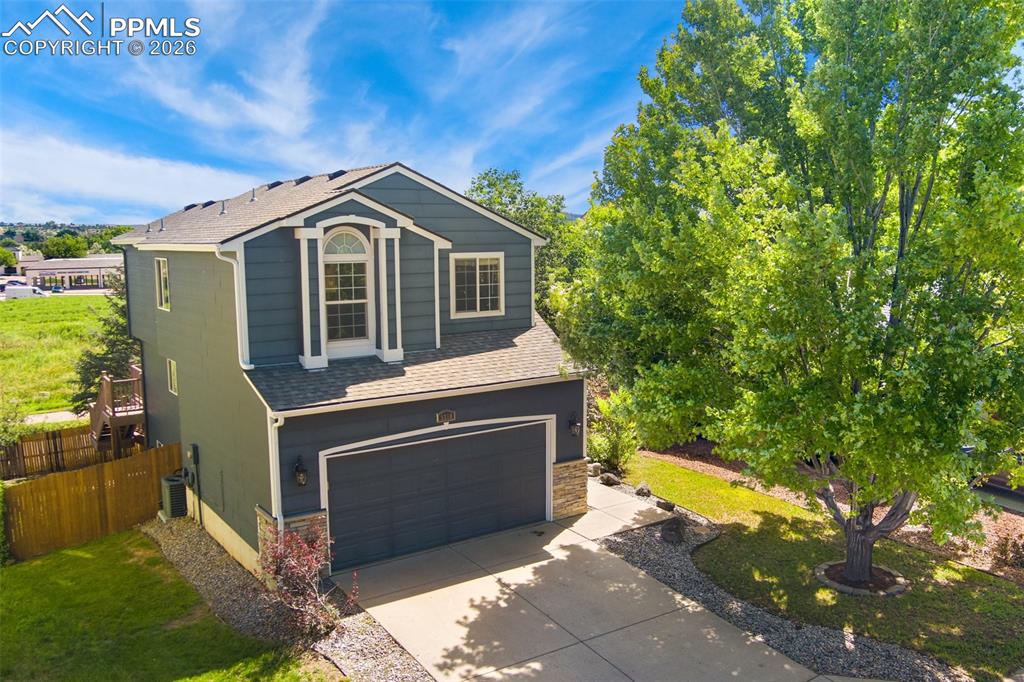 Image 1 of 47: Summer time photo of home.
