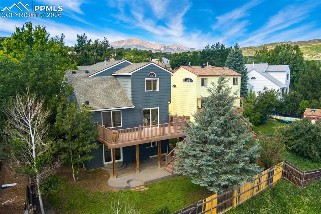 Image 2 of 47: Summer time photo of home.