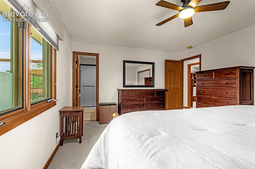 Image 13 of 42: Primary bedroom with ensuite bath