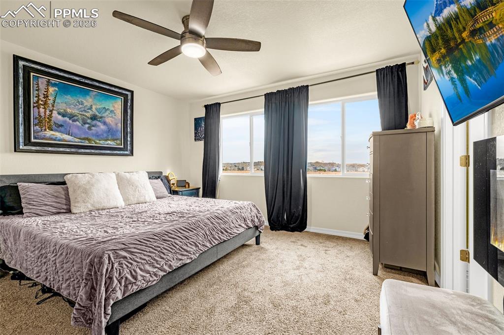 Image 16 of 33: Main Bedroom on the top floor with plenty of space and offers plenty of na